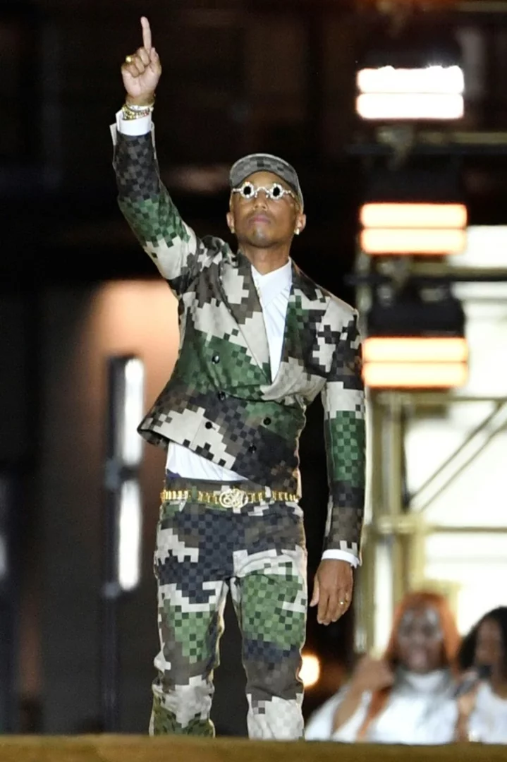 Pharrell brings gospel party to Paris with fashion debut