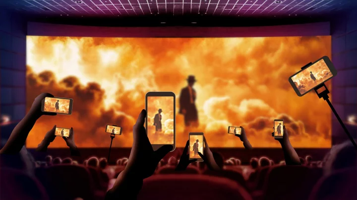 Why is everyone using their phones in movie theaters?