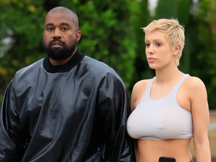 Kanye West’s ‘wife’ Bianca Censori sparks confusion after using pillow to cover nearly nude outfit in Italy