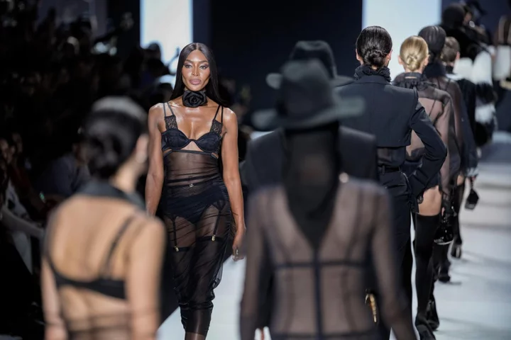 Naomi Campbell wears black lingerie on Dolce and Gabbana catwalk