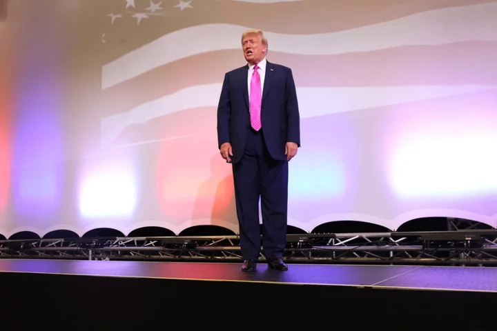 Trump news – live: Trump rails against ‘villains’ as he is named ‘Man of the Decade’ at Michigan GOP dinner