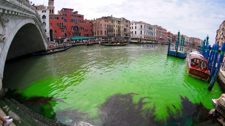 Venice canal mysteriously turns fluorescent green