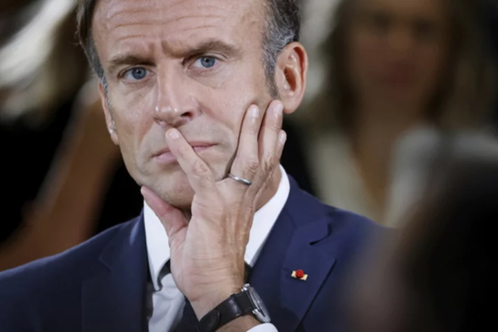 France's Macron supports experimenting with uniforms in some schools amid debate over ban on robes