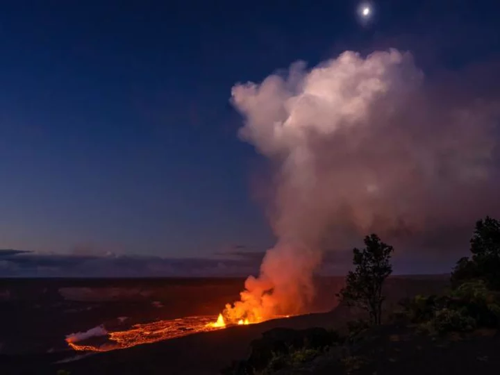 Alert level lowered for Hawaii's erupting Kilauea volcano as thousands watch the dazzling display