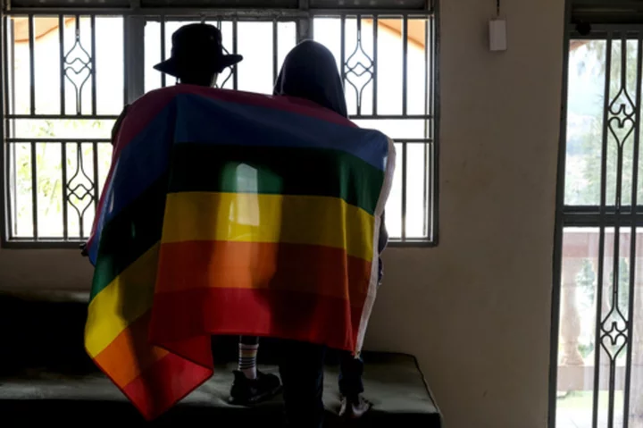 Uganda's president signs into law anti-gay legislation with death penalty in some cases