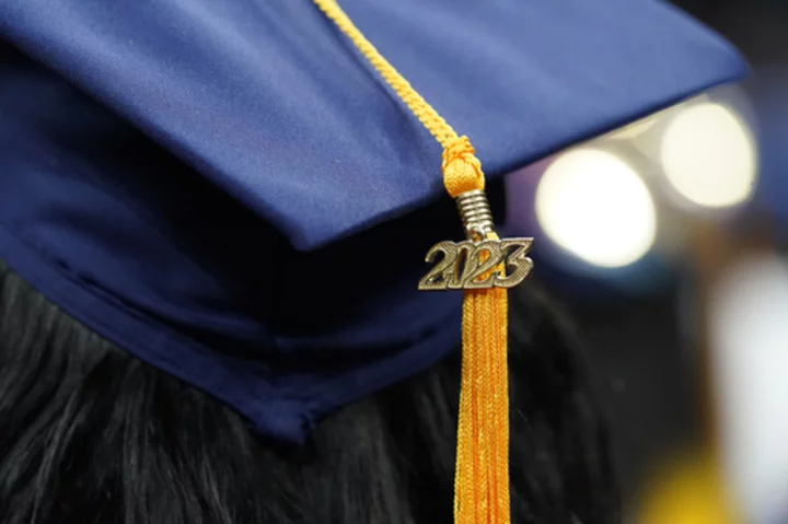 Judges halt a Biden rule offering student debt relief for those alleging colleges misled them