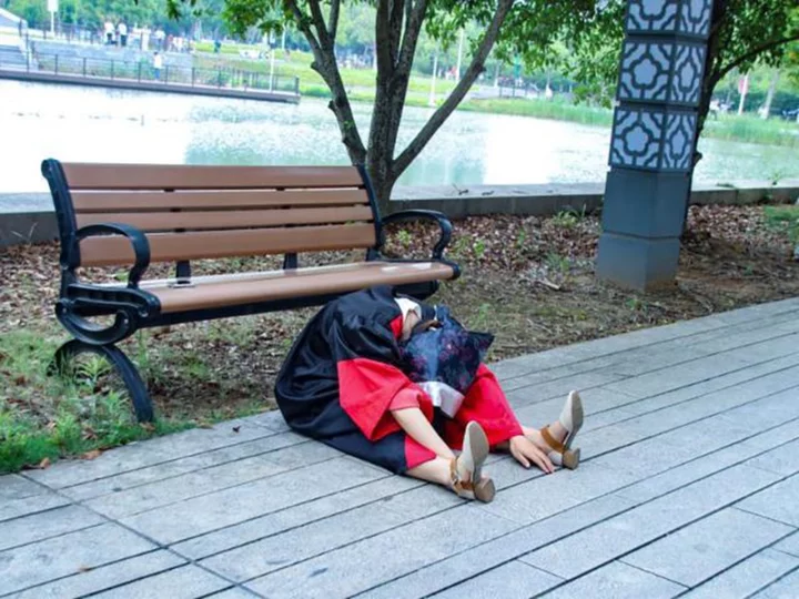 Why Chinese students are taking graduation photos looking 'more dead than alive'