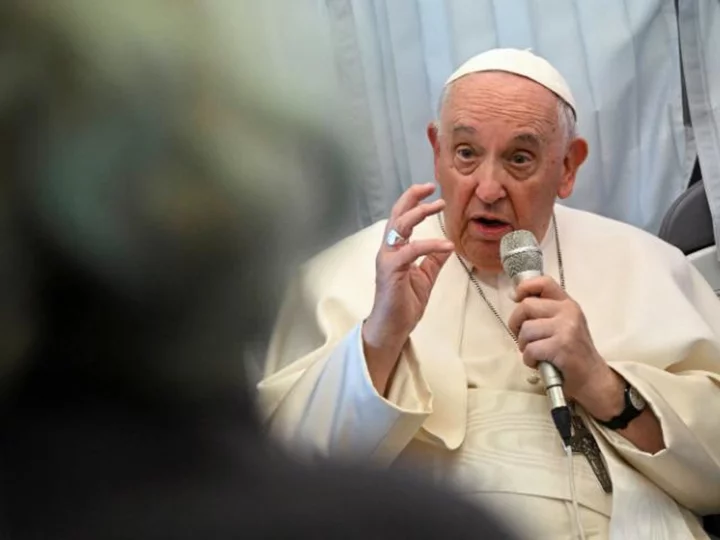 Pope Francis returns to work after suffering fever