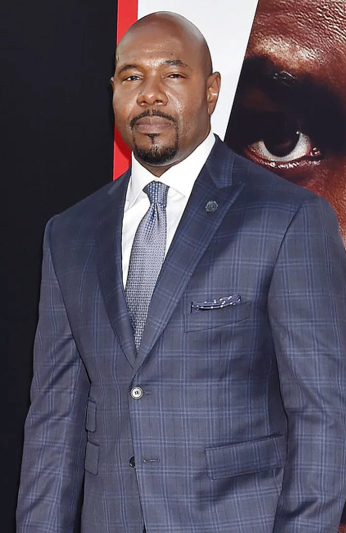 'People love seeing him deliver justice': Antoine Fuqua credits Denzel Washington for The Equalizer's success
