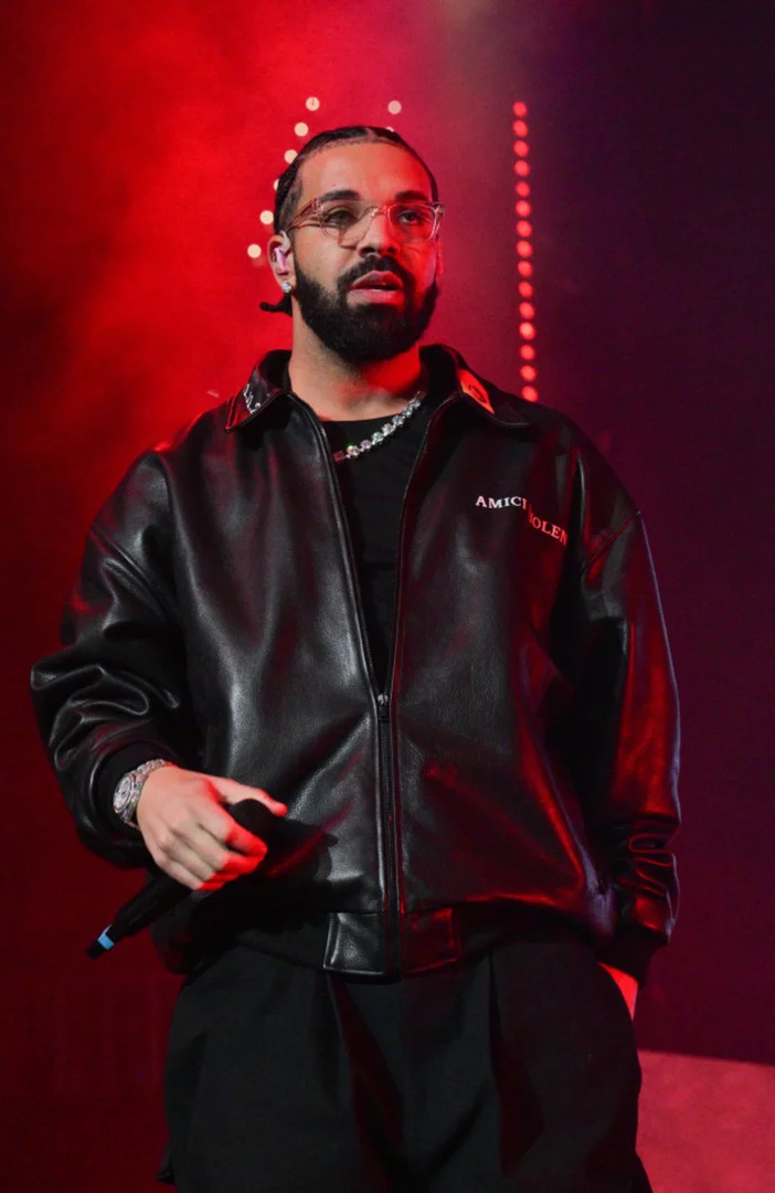 Drake performs with hologram of his younger self