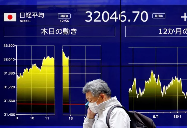 Asia stocks hover near 16-month peak; Aussie slides after RBA