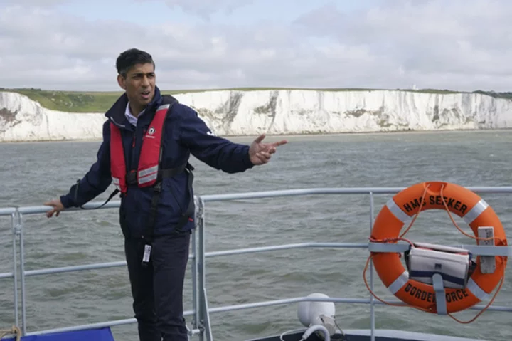 UK to house hundreds more migrants on barges, Sunak says