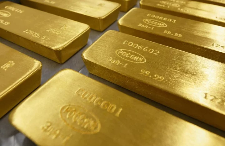 Gold frail as US dollar, yields hold ground after inflation data