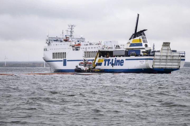 New oil leak reported after a ferry that ran aground repeatedly off the Swedish coast is pulled free