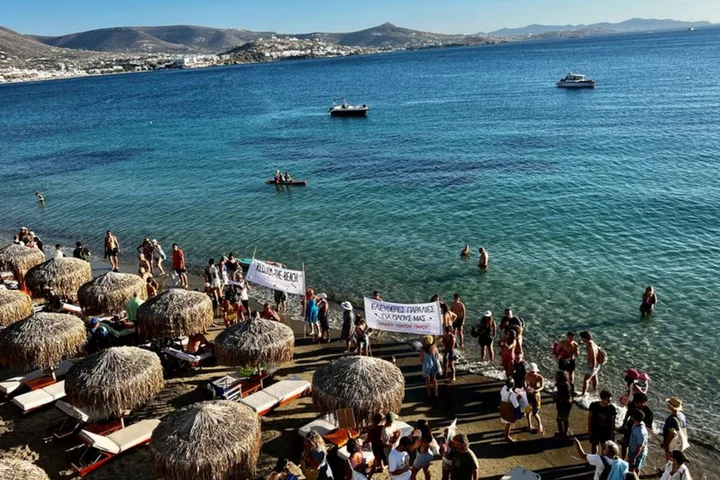 Greeks fight for space on the beach as pricey sunbeds multiply