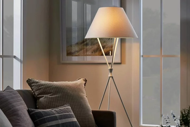 This all-white tripod floor lamp is $60