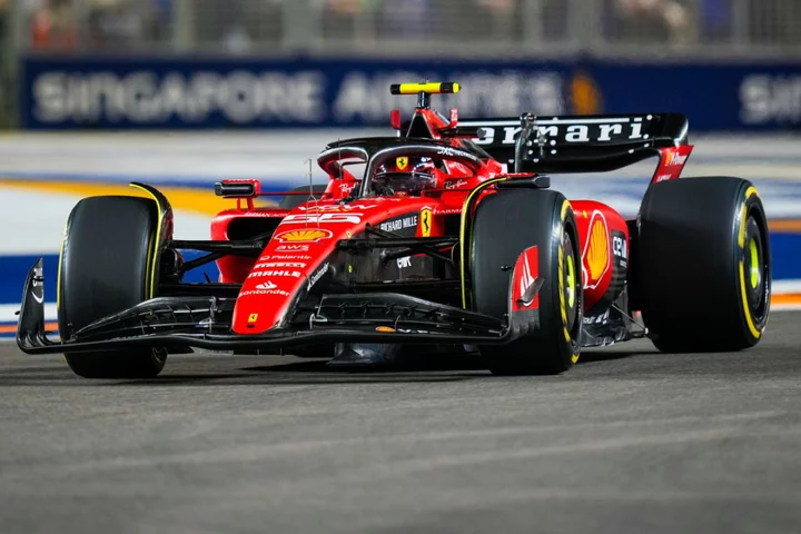 Carlos Sainz holds on for victory in Singapore as Red Bull’s winning run ends