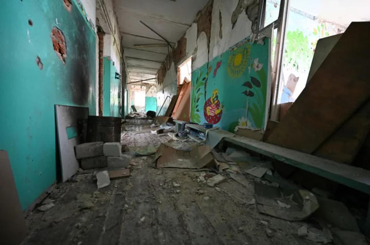 Children in war-torn Ukraine go back to school