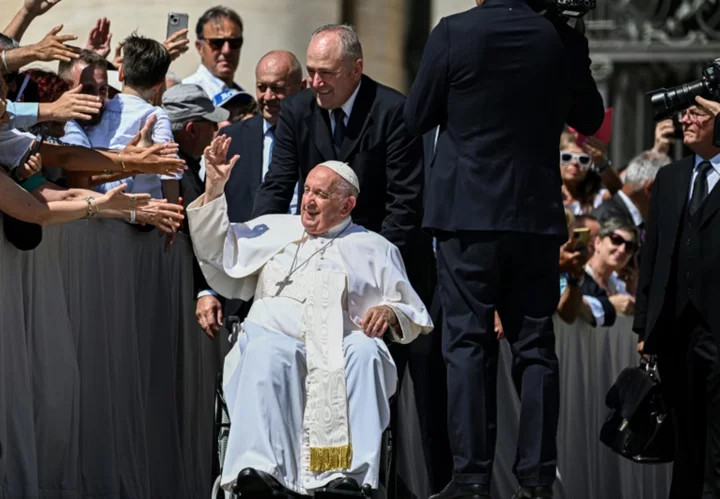 Pope awake and joking after hernia operation