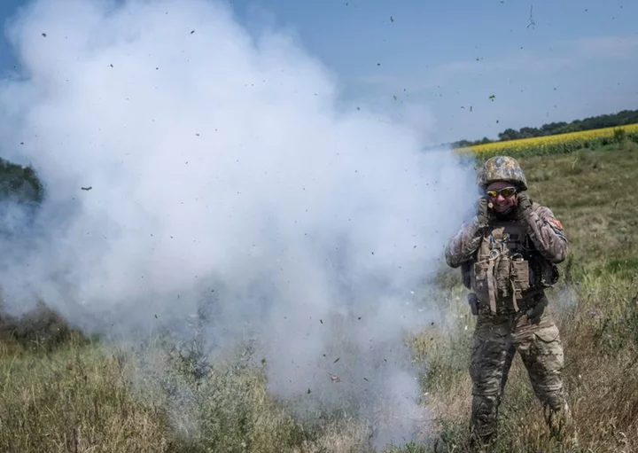 On Ukraine's landmine-strewn front, even the corpses can kill