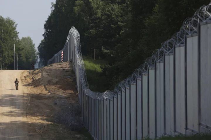 Poland's ruling party leader vows to protect the EU border with Russia's ally Belarus