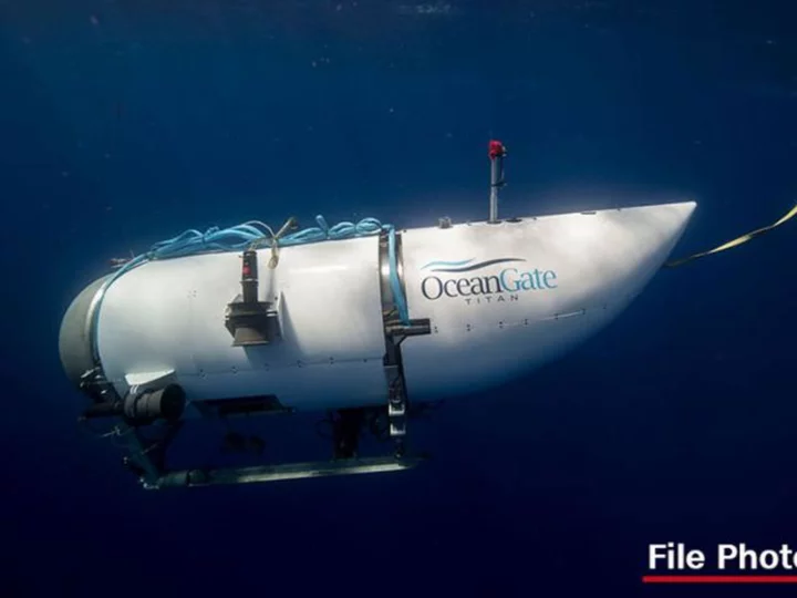 A challenging search in remote waters intensifies for the missing submersible that was touring the Titanic wreckage with 5 on board