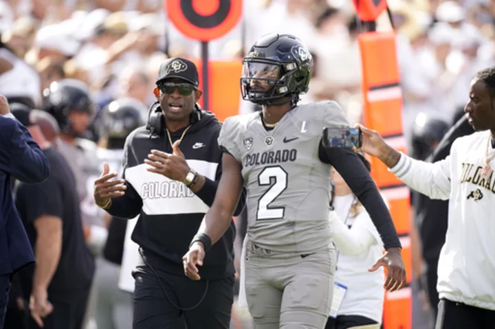 Deion Sanders heaps praise on his QB son Shedeur Sanders after comeback falls short vs. No. 8 USC