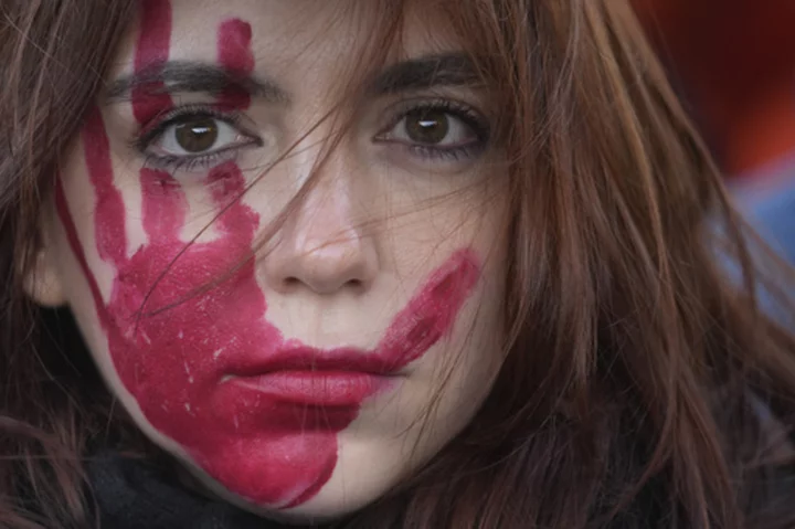 Thousands rally in Italy over violence against women after woman's killing that outraged the country