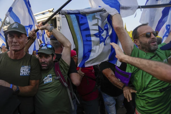 Protests kick off at Israeli justice minister's home a day before major hearing on judicial overhaul