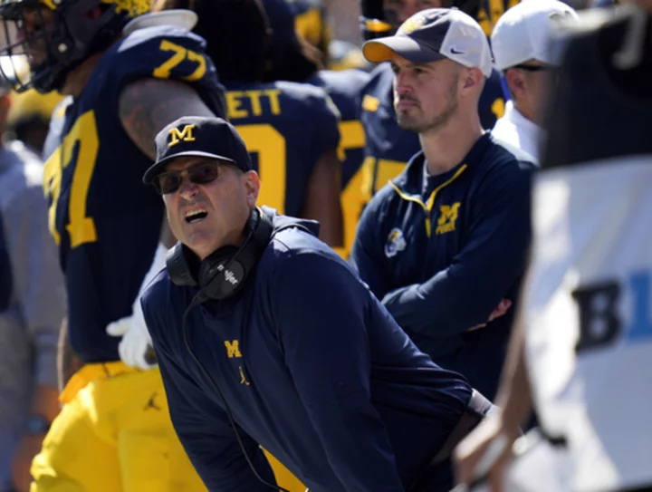 Harbaugh says he'd 'love to' talk about Michigan's sign-stealing investigation, but can't yet