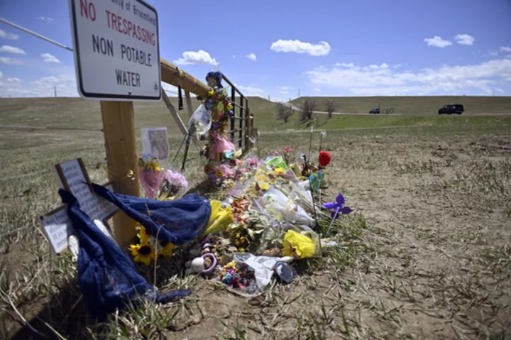 Colorado men accused of taking photo after rock-throwing death will stand trial for murder