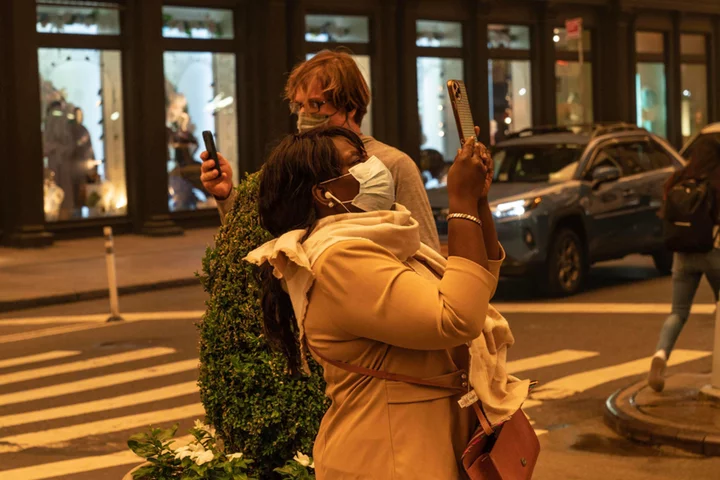 Air quality: Surreal skies grip New Yorkers - in pictures