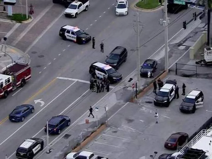 Tourists flee Florida beach in terror as gunshots ring out in harrowing video of Hollywood shooting