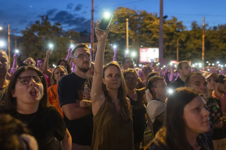 Thousands in Serbian capital protest pro-government TV station after 2 mass shootings in May