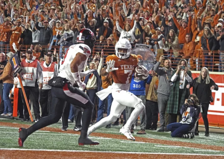 No. 7 Texas overwhelms Texas Tech 57-7 to reach Big 12 championship game