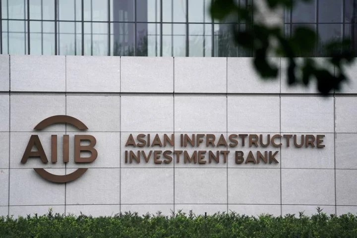 Ex-AIIB comms chief says was advised to flee China after fiery resignation