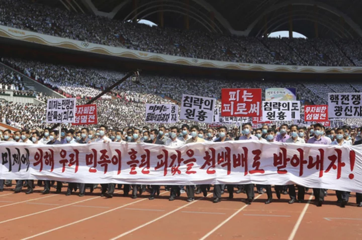 Thousands of North Koreans march in anti-US rallies as country marks Korean War anniversary