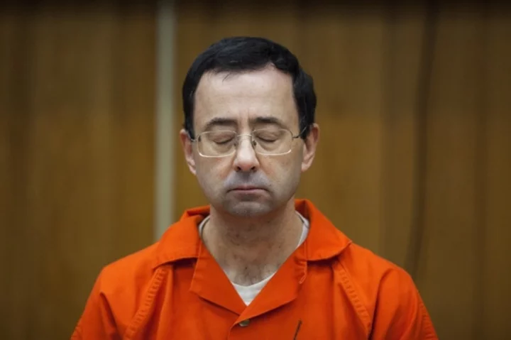 Larry Nassar was stabbed in prison cell, attack not seen by surveillance cameras, AP source says