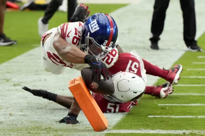 New York Giants running back Saquon Barkley says he has a high ankle sprain