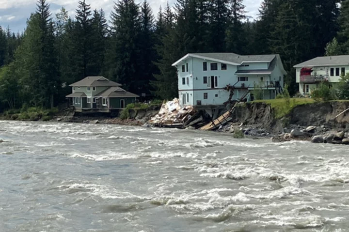 Authorities assess damage after flooding from glacial dam outburst in Alaska's capital