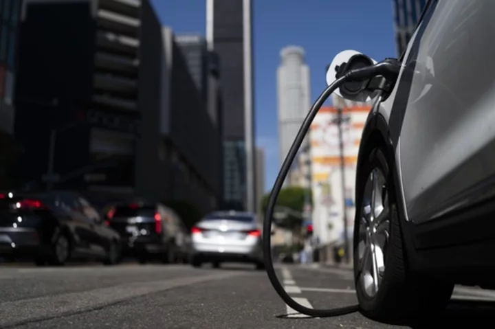 Major automakers unite to build electric vehicle charging network they say will rival Tesla's