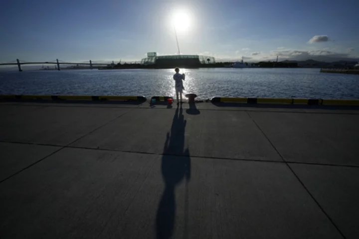 Fukushima residents react cautiously after start of treated water release from wrecked nuclear plant