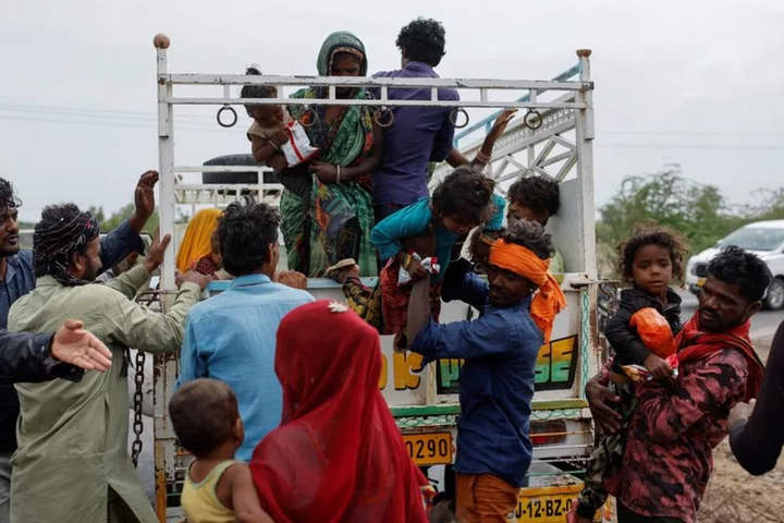 Fast approaching cyclone forces evacuation of 75,000 people on India's west coast