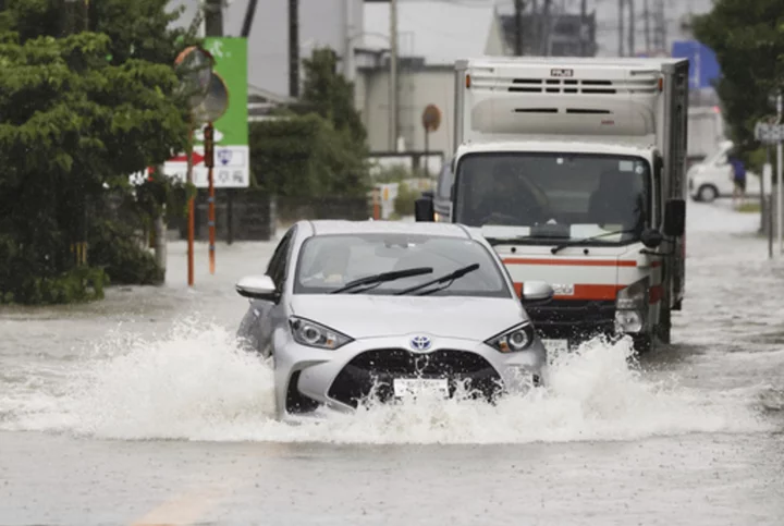 Heavy rains cause flooding and mudslides in southwest Japan, where at least 6 people are missing