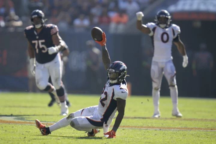 Russell Wilson throws 3 TDs, Broncos rally from 21 down to top Bears 31-28