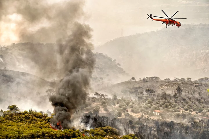 Europe heatwave live: Hundreds flee wildfires for third day as Greece braces for extreme temperatures