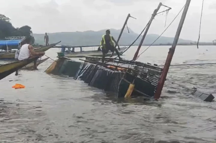 Wind-tossed boat with dozens of people aboard overturns in Philippines, search and rescue underway