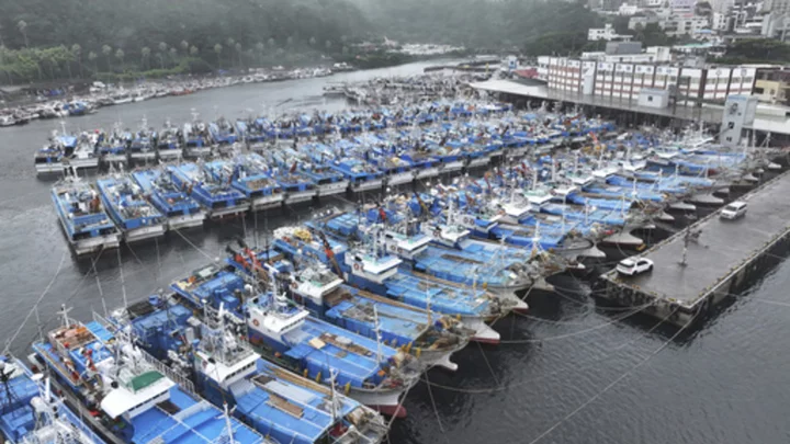 Flights and ferries halted in South Korea ahead of storm that's dumped rain on Japan for a week