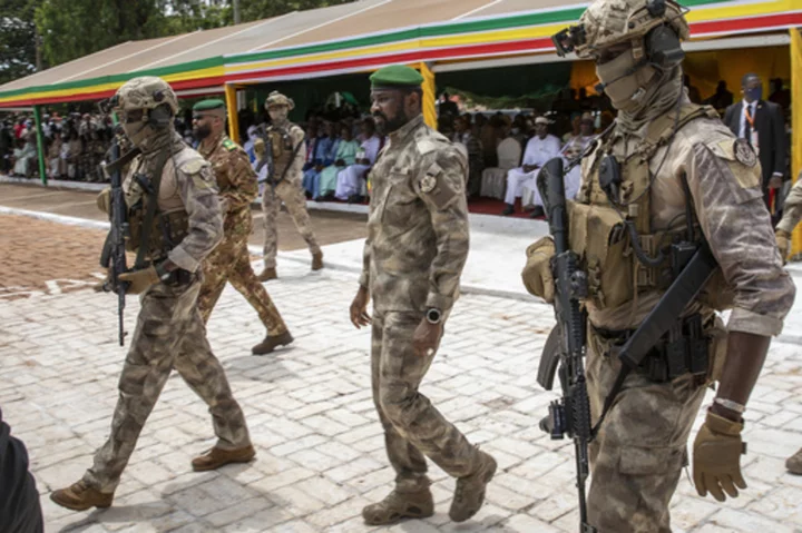 Mali's military junta holds referendum on new constitution that it calls a step toward new elections