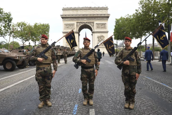 France celebrates Bastille Day with pomp, a tribute to India and extra police to prevent new unrest